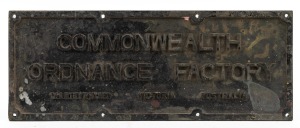 "COMMONWEALTH ORDNANCE FACTORY MARIBYRNONG VICTORIA AUSTRALIA" (often referred to as "The Bomb Factory") bronze architectural name plaque, circa 1920s, ​​​​​​​18 x 45.5cm.