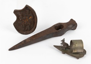 An antique miner's pick head found on the Victorian goldfields, together with a silver plated napkin ring with kangaroo decoration, and a novelty cast metal ashtray, 19th/20th century, (3 items), the pick 26cm long.