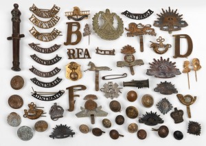 Assorted military badges, buttons, miniature bronze cannon, etc, (qty)