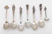 Six assorted silver teaspoons and a salt spoon with Australian motifs, 20th century, (7 items), the largest 10cm long, 68 grams total.