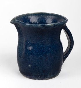 MERRIC BOYD blue glazed pottery jug, incised "BOYD, 23", 13cm high.