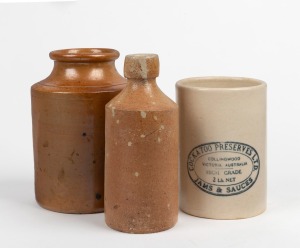COCKATOO PRESERVES pottery jam jar, stoneware tobacco jar and an English pottery ginger beer bottle by Doulton Lambeth, (3 items), the jam jar 13cm high.