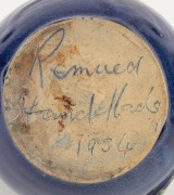 REMUED blue glazed pottery jug with applied gumnuts and leaves, incised "Remued, Hand Made, 1934", 12cm high. - 2