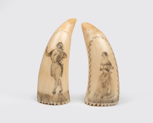 A pair of scrimshaw whale's teeth with male and female portraits, 9cm and 9.5cm high.