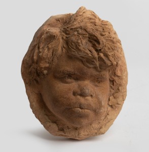 WILLIAM RICKETTS pottery wall plaque of an Aboriginal child, incised "Wm. Ricketts", 11cm high.