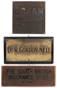 Three Antique Brass Signs Comprising Of: I.) District Agent For The Ocean Accident & Guarantee Corporation Ltd. Fire & Accident Insurance (Brisbane), Ii.) The South British Insurance Co. Ltd. Agency, Iii.). Dr. R. Gordon. Nell, The Largest 48 X 48.5cm.