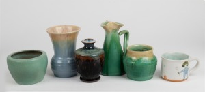 ERIC JUCKERT green glazed pottery bowl, REMUED green glazed pottery jug and two vases, SYLVIA HALPERN hand-painted pottery cup, and a pottery vase, (6 items), the largest 14cm high.