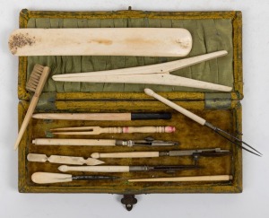 Assorted antique whalebone implements, glove stretcher, brush and busk, 19th century, (12 items), the largest 17cm long.