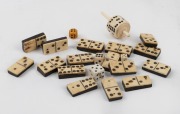 Antique whalebone and ebony domino tiles (not complete), together with a whalebone gaming top and assorted dice, (qty)