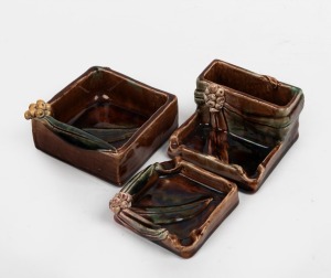 HARVEY SCHOOL pottery smoker's stand, ashtray and bowl, all with applied gumnuts and leaves, (3 items), each incised "M.E. 1932", the largest 11cm wide.