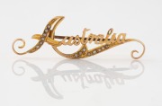 DUGGIN, SHAPERE & Co. of Melbourne antique 9ct gold and seed pearl "AUSTRALIA" brooch, ​​​​​​​4.7cm wide, 2.3 grams.
