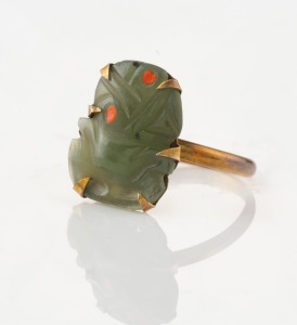 A New Zealand 9ct gold and greenstone Tiki ring, stamped "9ct", 2.1 grams total.