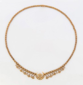 An antique Australian 15ct gold necklace adorned with crescent and star, set with seed pearls, most likely Melbourne made, 19th century, marks rubbed, 41cm high, 14 grams total.