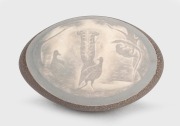 An antique Australian emu egg ornament carved with lyrebird decoration in landscape, 19th/20th century, ​​​​​​​14cm long.