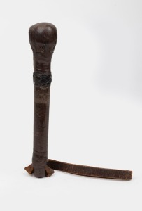 An antique leather covered cosh with lead weighted end, 19th/20th century, 35cm long overall.