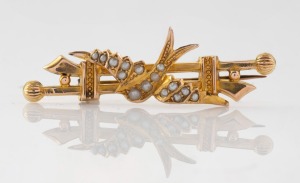LARARD BROS. of Melbourne antique 9ct gold brooch with swallow decoration adorned with seed pearls, 19th/20th century, stamped "9ct" flanked by pictorial marks, 5cm wide, 3 grams.