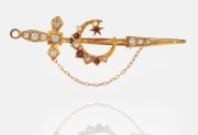 SIMONSEN of Melbourne antique 9ct gold sword brooch, set with seed pearls and red stones, 19th/20th century, 6.5cm long, 3.5 grams.