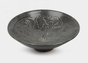 HAROLD HUGHAN grey glazed pottery bowl with incised floral motif, signed "Hughan", 5cm high, 16.5cm diameter.