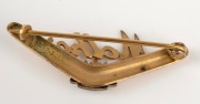 A WW1 period 9ct gold silver lined "MOTHER" souvenir boomerang brooch with enamel rising sun A.I.F. insignia, 3.7cm wide, 2.2 grams. - 2