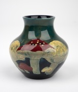 MOORCROFT "Claremont" miniature pottery vase on celadon green ground, impressed "Moorcroft", 8cm high. - 2