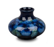 MOORCROFT rare "Moonlit Pansy" pottery vase, impressed "Moorcroft, Made In England", 8cm high, 10.5cm wide.
