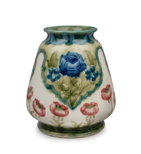 MOORCROFT "Poppy & Forget Me Nots" early pottery vase on cream ground, stamped "MACINTYRE, Burslem, England, MADE FOR PRINGLE'S Ltd." with green signature "Moorcroft", 10cm high.