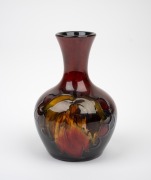 MOORCROFT flambe "Leaves and Berries" miniature pottery stem vase, impressed signature mark to base "Moorcroft, Potter To H.M. The Queen, Made In England", 9cm high. - 2