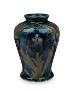 MOORCROFT "Late Florian" miniature pottery vase, impressed signature mark to base "Moorcroft, Burslem", 9cm high.