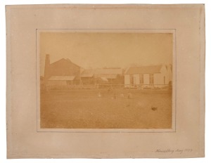 HEIDELBERG, MELBOURNE: Large format albumen photograph with view of paddock and buildings, inscribed lower right on the mount "Heidelberg, May 1879". Mounted on original card, the image is somewhat faded but possibly unique. Sheet size 21.5 x 30cm.