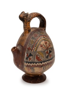 A Nazca pottery stirrup pot with jaguar handle and hand-painted decoration, unknown age, 21cm high.