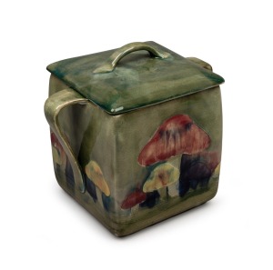 MOORCROFT "Claremont" pottery biscuit barrel on celadon green ground, underglazed green signature mark to base, 16cm high.