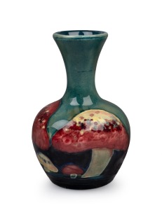 MOORCROFT "Claremont" miniature pottery stem vase on celadon green ground, impressed "Moorcroft, England", 9.5cm high.