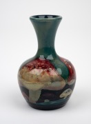 MOORCROFT "Claremont" miniature pottery stem vase on celadon green ground, impressed "Moorcroft, England", 9.5cm high. - 2