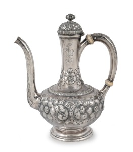 23 · An antique American silver coffee pot with floral repousse decoration by Gorham Manufacturing Company of Rhode Island, 19th century, ​​​​​​​19cm high, 395 grams.