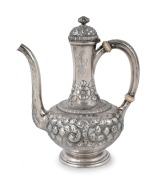 An antique American silver coffee pot with floral repousse decoration by Gorham Manufacturing Company of Rhode Island, 19th century, ​​​​​​​19cm high, 395 grams.