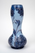 MOORCROFT "Lilac" pattern pottery vase on sky blue ground, stamped "Florian Ware, JAS. MACINTYRE" and signed "W. Moorcroft", ​​​​​​​28cm high. - 2
