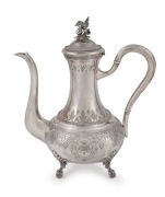 An antique French silver coffee pot with engraved decoration and griffin finial, 19th century, ​​​​​​​23cm high, 406 grams.