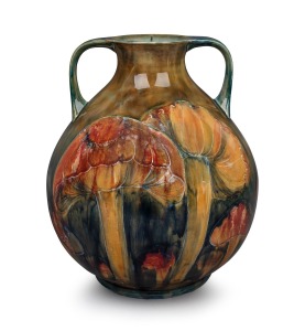 MOORCROFT "Claremont" pattern pottery vase with two handles (base holed for lamp conversion, signed in green "W. Moorcroft", 31cm high, 27cm wide.