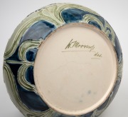MOORCROFT "Florian Ware" pottery jardiniere on celadon green ground with blue highlights with iris and forget me not decoration, signed in green "W. Moorcroft, des.", 19cm high, 26cm diameter. - 3
