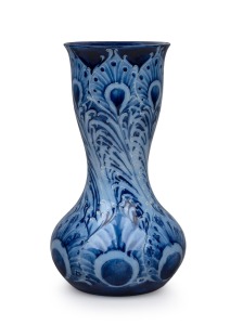MOORCROFT "Florian Ware" pottery vase with peacock decoration on blue ground, stamped "Florian Ware" with signature, 32cm high.