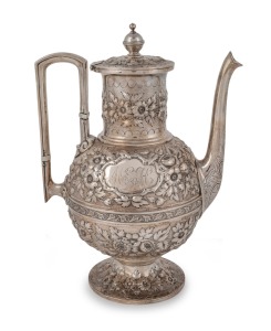 28 · An ornate antique sterling silver coffee pot with floral repousse decoration, retailed by Mansfield & Baird, 19th century, stamped "STERLING", ​​​​​​​27cm high, 870 grams.