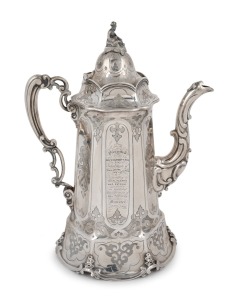 A fine quality antique English sterling silver coffee pot with engraved Gothic decoration and cast figural finial, engraved "Presented To The REV. W. BURDETT M.A. By The Inhabitants Of North Molton and Twitchen As A Testimony Of Their Grateful Recognition Of His Service As Their Minister, 17th Jan. 1858", made in London, circa 1855, 30cm high, 980 grams.