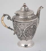 A Persian silver coffee pot with ornate engraved decoration and bone handle, stamped "VARTAN A.O." with Arabic cartouche, 20th century, ​​​​​​​18cm high, 516 grams total. - 2