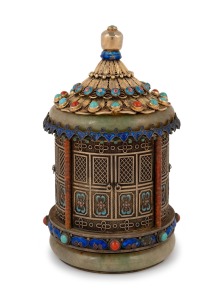 39 · An antique Chinese filigree silver and jade lidded jar with enamel highlights, gilt finish, inlaid with cabochon turquoise and coral, 19th/20th century, stamped "SILVER", 13cm high.