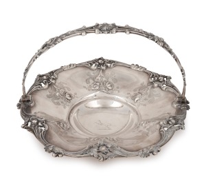 71 · An antique English sterling silver basket with repousse floral decoration, made by Robinson, Edkins & Aston of Birmingham, circa 1840, 24cm high, 31cm wide, 796 grams.