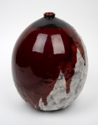 LOUIS DAGE French pottery vase, glazed in ox blood and mottled cream, early 20th century, signed "L. Dage, Made in France", 26cm high. - 2