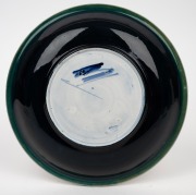 MOORCROFT "Waratah" pottery bowl on celadon green ground trending to dark blue on the reverse, impressed signature mark to base "Moorcroft, Potter To H.M. The Queen,. Made In England", 22.5cm diameter. - 2
