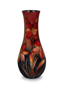 MOORCROFT "African Lily" flambe pottery vase, impressed signature mark "Moorcroft, Potter To H.M. The Queen, Made In England", with blue signature to base, 28cm high.
