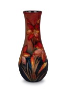 MOORCROFT "African Lily" flambe pottery vase, impressed signature mark "Moorcroft, Potter To H.M. The Queen, Made In England", with blue signature to base, 28cm high.