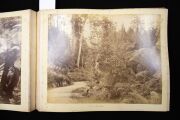 PHOTOGRAPHS OF TASMANIA by J.W. BEATTIE housed in an attractive album with gilt title to the cover, containing 23 albumen prints affixed to pages with hand-written notations and printed captions, images mainly 21 x 26.5 cm. - 9